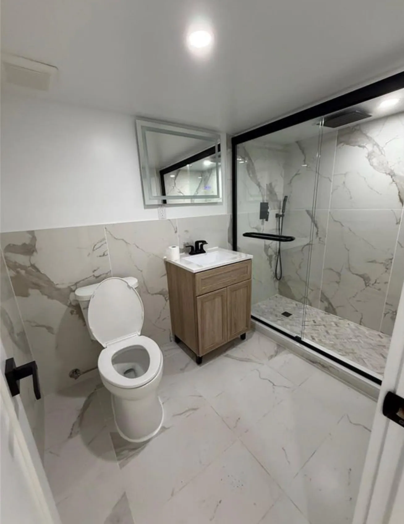 Second bathroom, with a walk-in enclosure worked into the plan.