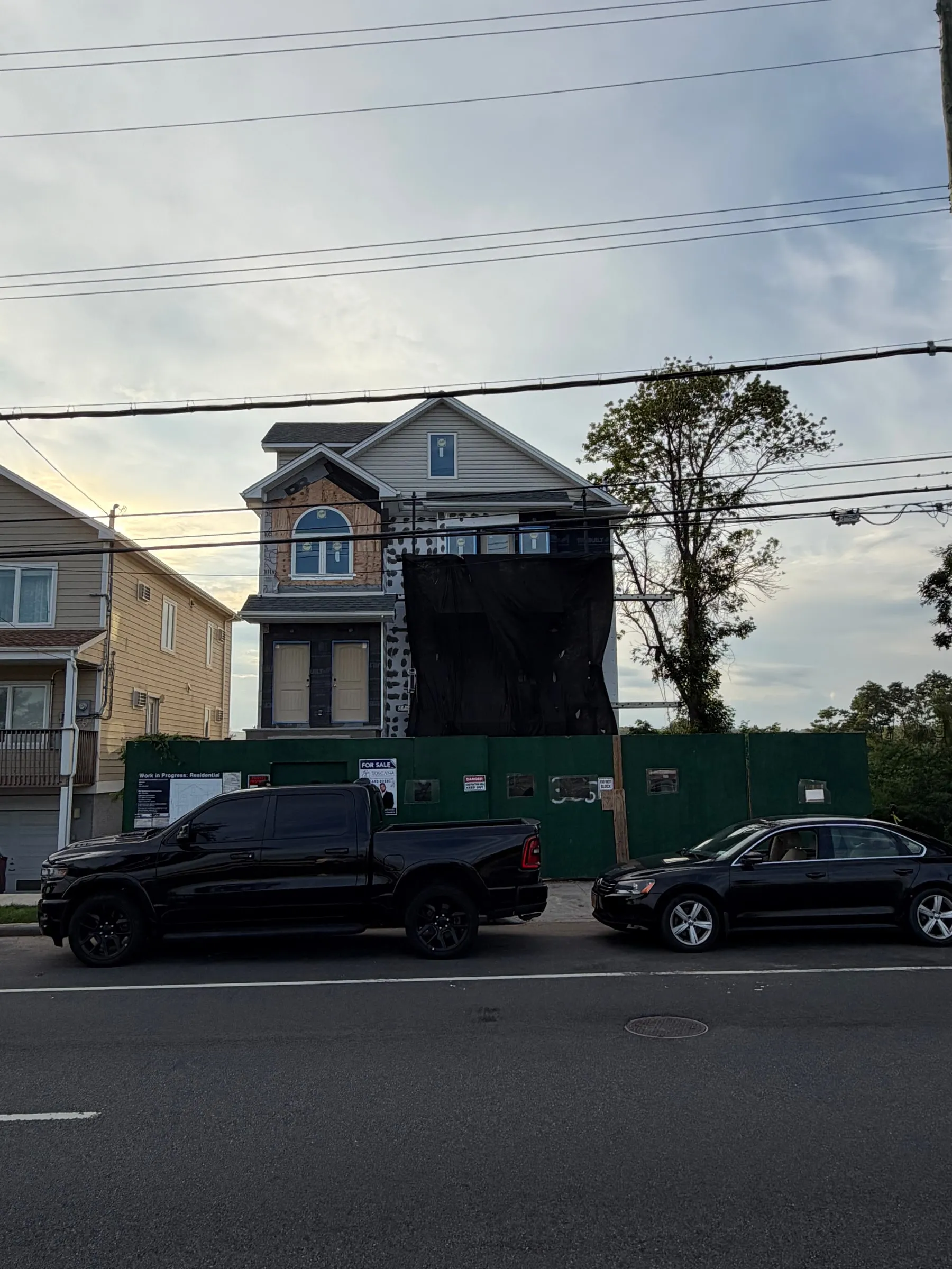 The street elevation as it stands, with the front most of the way closed out.